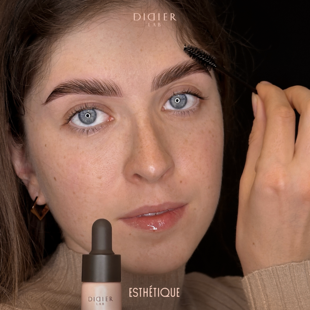 Woman applying skincare product with 'DIGIER LAB' and 'ESTHÓTIQUE' branding.